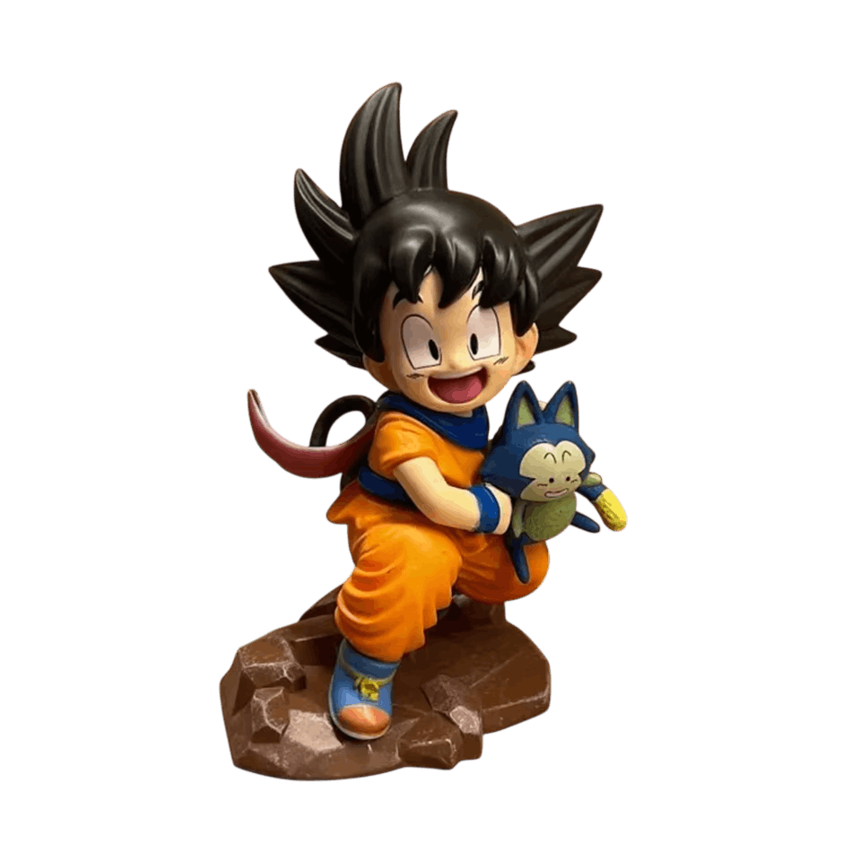 Figurine PVC de Goku enfant accroupi sur un rocher, Puar dans les bras — Dragon Ball