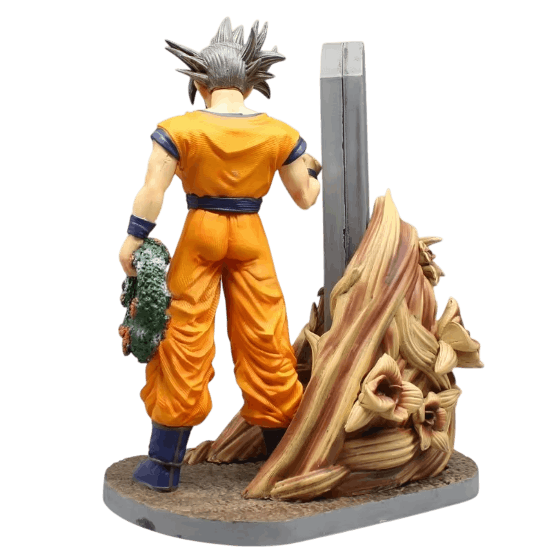Figurine Son Goku (Dragon Ball), 23 cm, socle en tertre de roche et d'herbe sèche — détourée, vue sans décor.