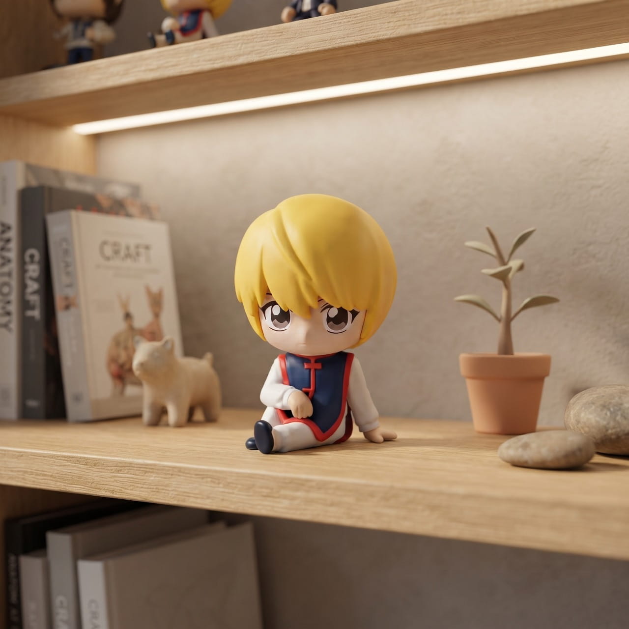 Figurine chibi Kurapika assis, exposée sur une étagère (décor non inclus)