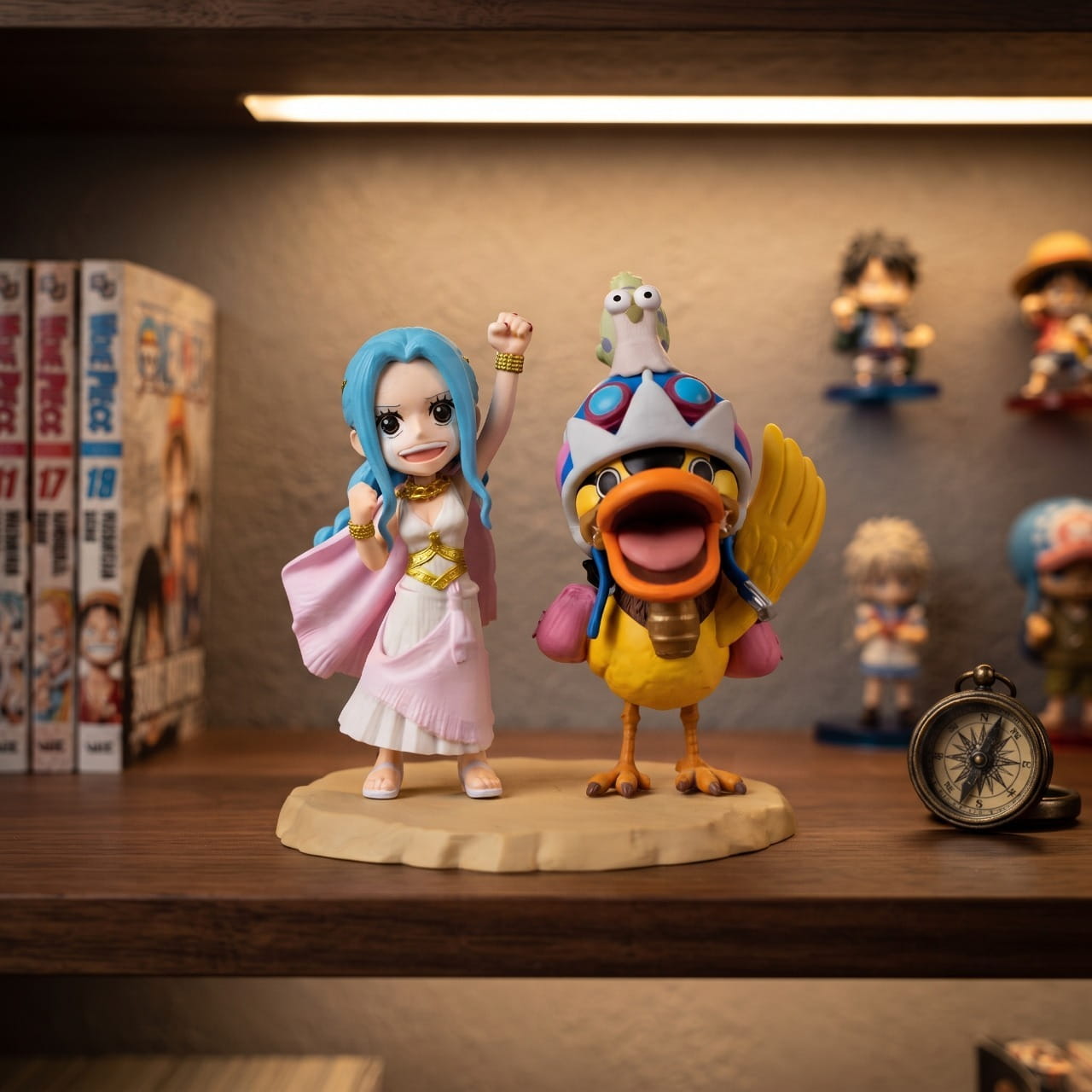Diorama One Piece Vivi et son canard Karoo, exposé sur une étagère (décor non inclus)