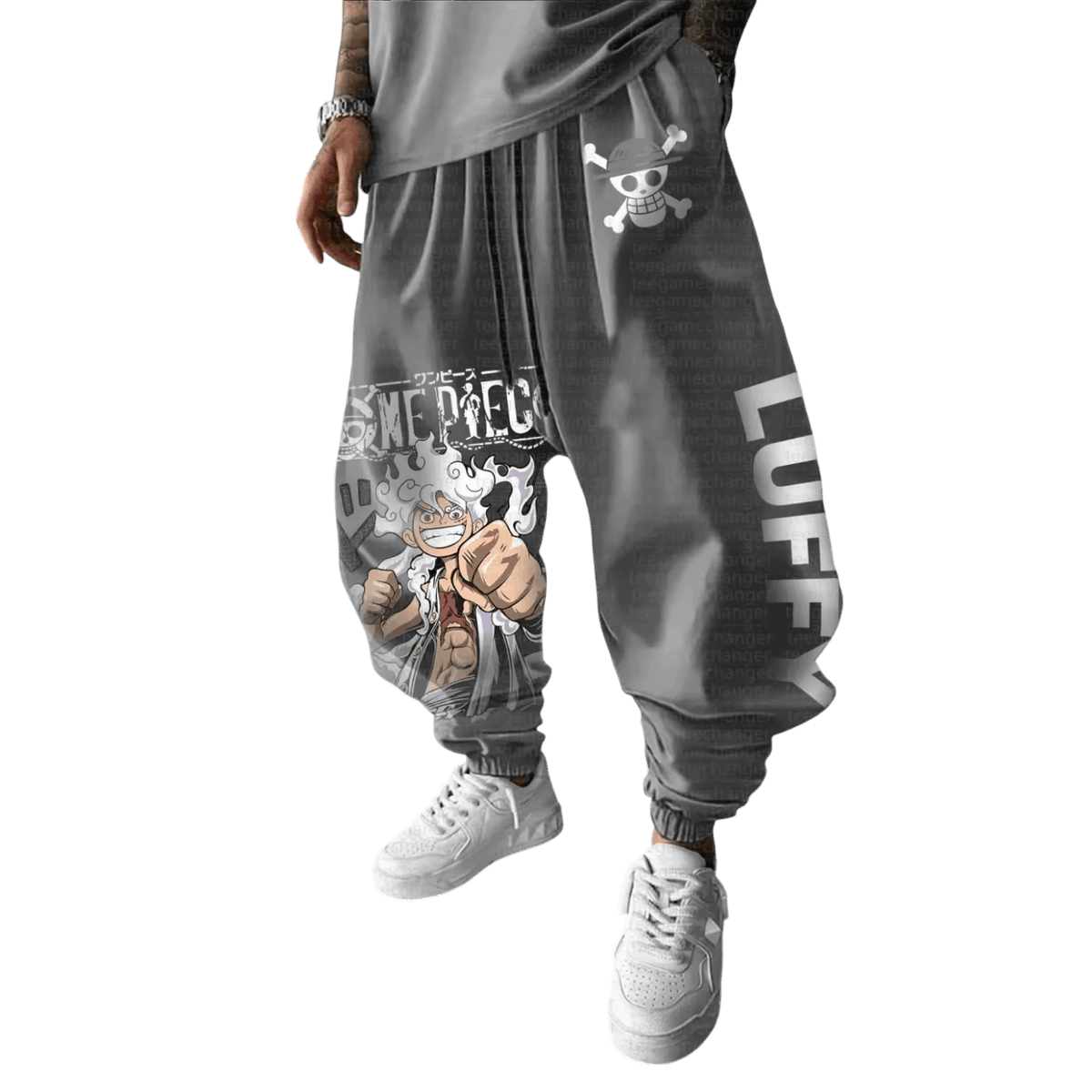 Dark gray One Piece joggers, Jolly Roger on the hip, Luffy Gear 5 on the thigh and LUFFY down the other leg