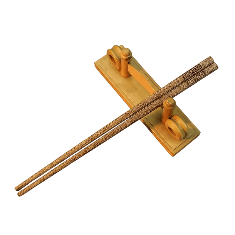 Baguettes One Piece en bois posées sur un repose-baguettes en bois