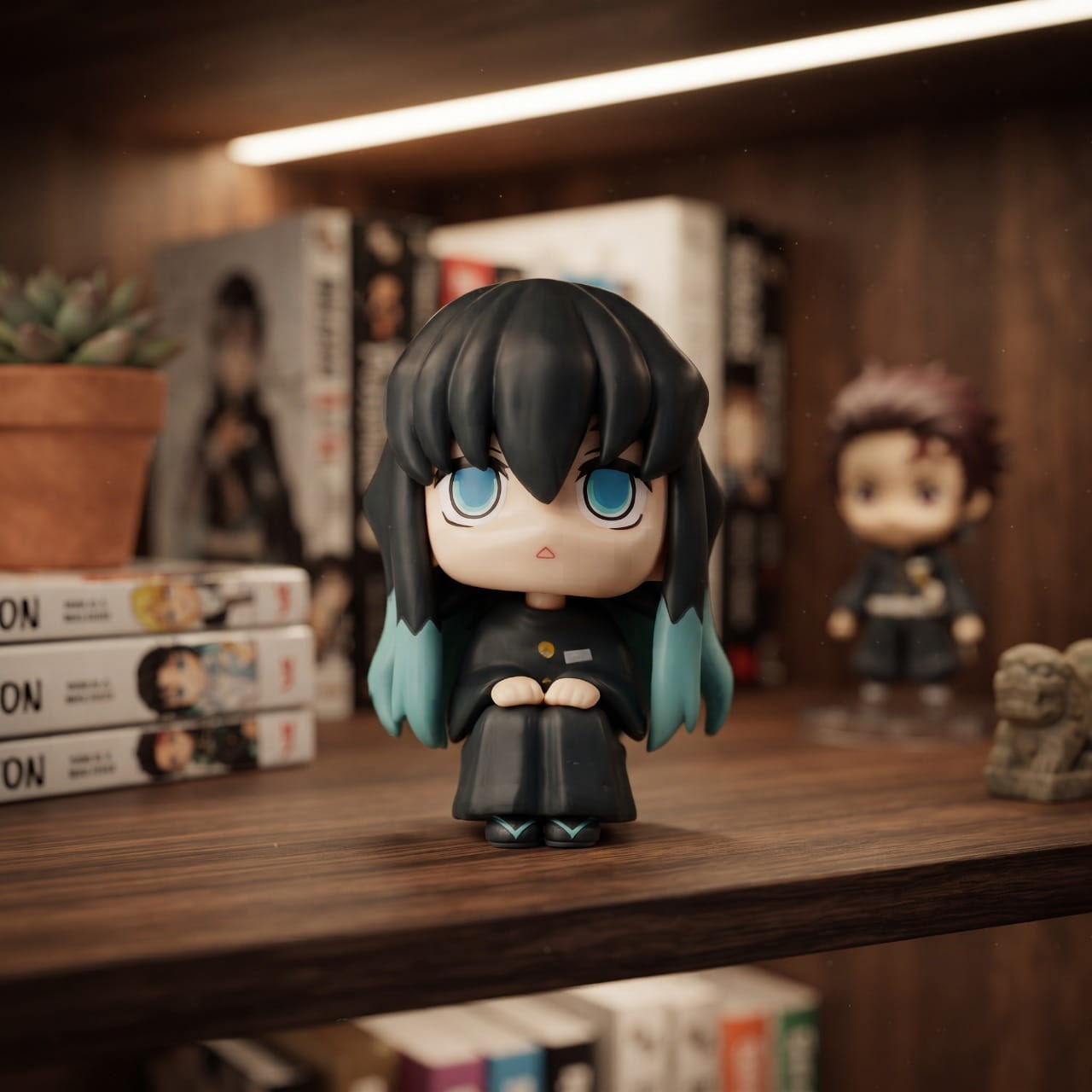 Figurine chibi Muichiro Tokito assis, exposée sur une étagère (décor non inclus)