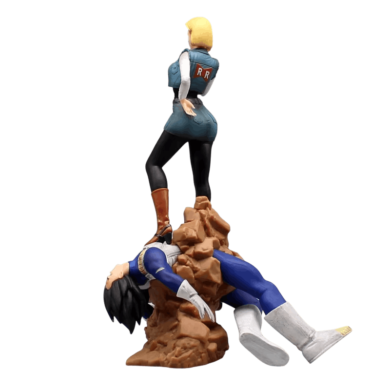 Dragon Ball C-18 and Vegeta figure 25 cm in profile: Vegeta in a blue bodysuit and white chest plate, laid out on the ochre rocks