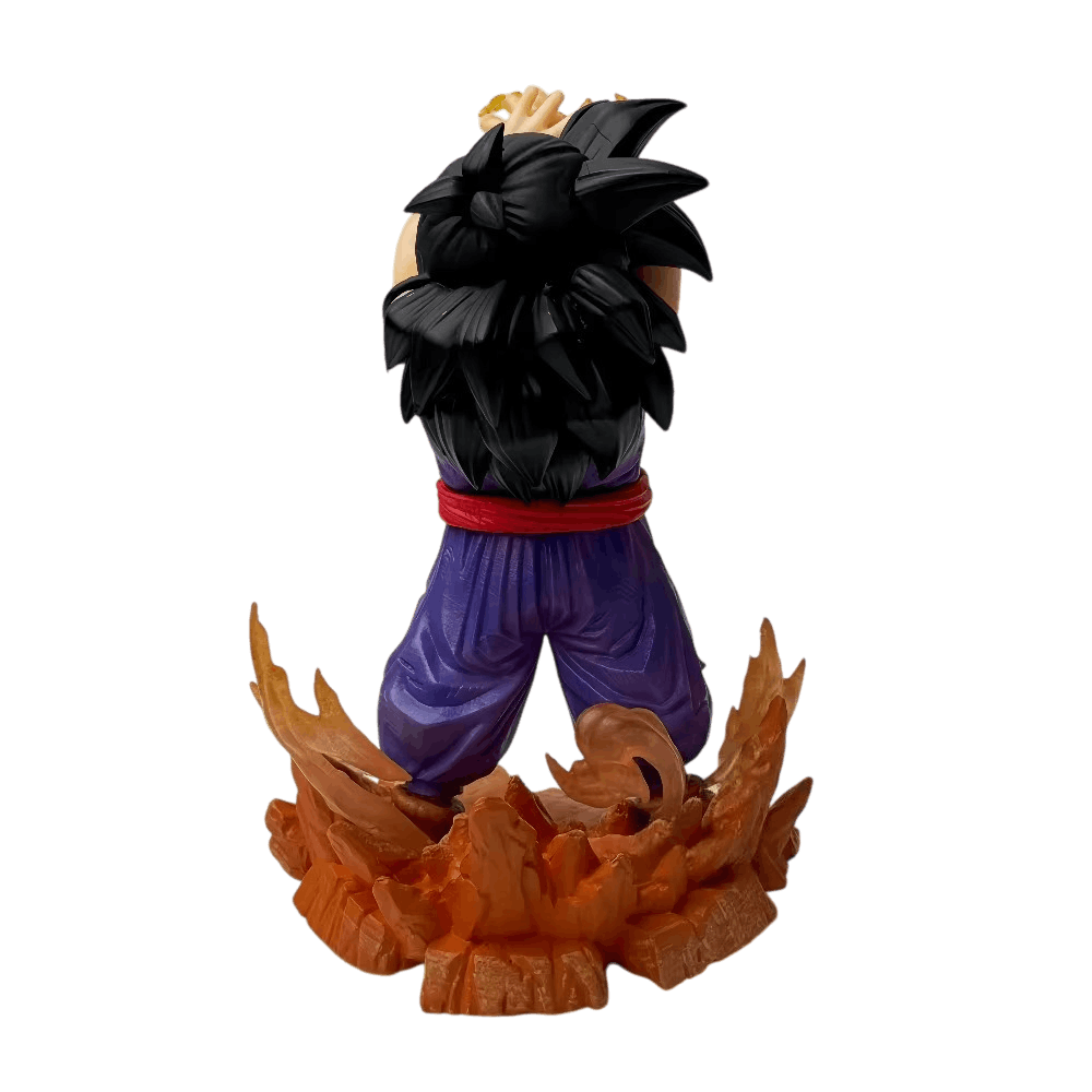 Figurine Gohan enfant Dragon Ball Z de dos : cheveux noirs, ceinture rouge et socle de rochers orange à flammes