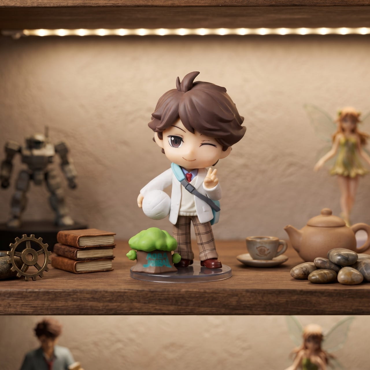 Figurine chibi Toru Oikawa — cheveux bruns coiffés, ballon sous le bras — Haikyu, étagère (décor non inclus)