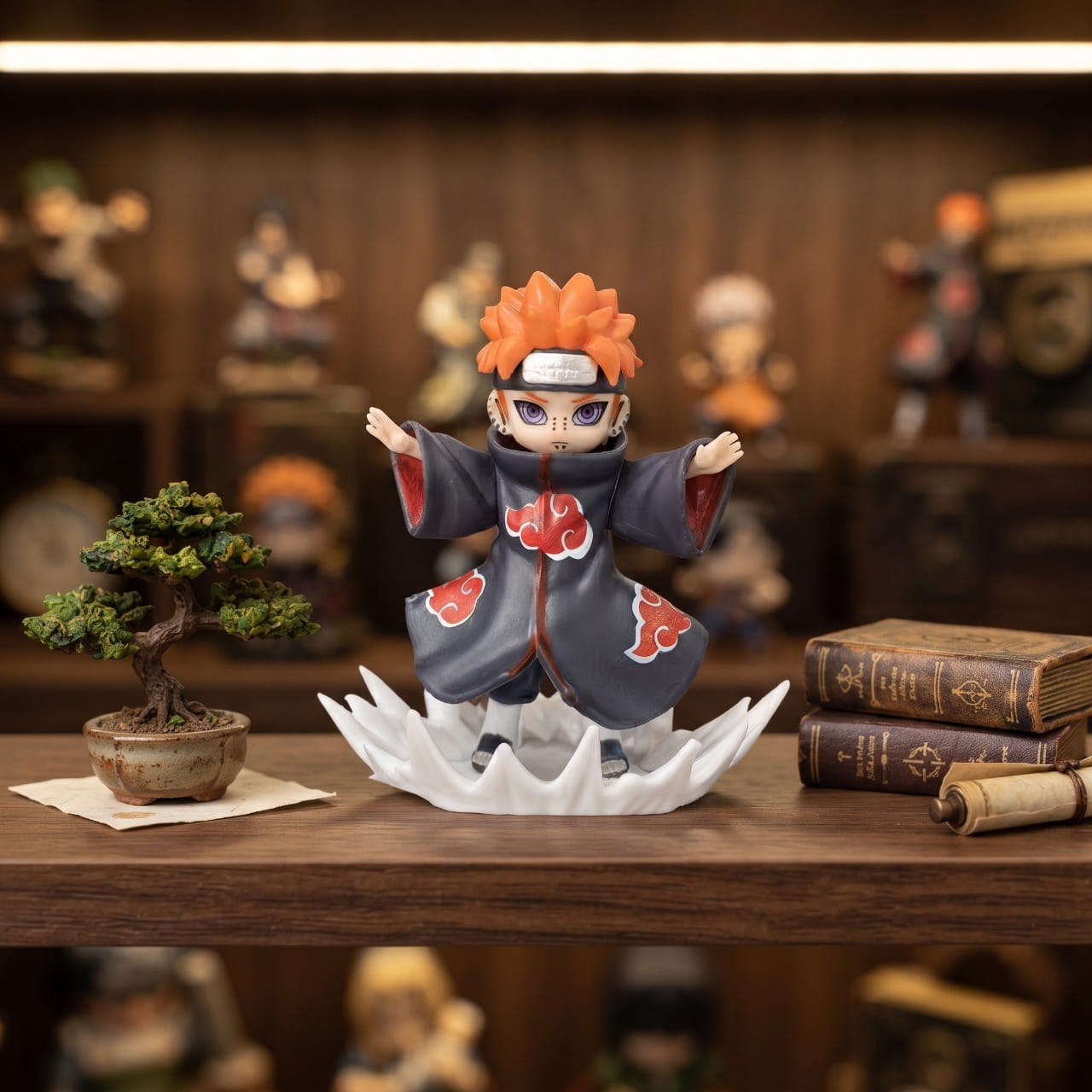 Figurine chibi Pain bras écartés, exposée sur une étagère (décor non inclus)
