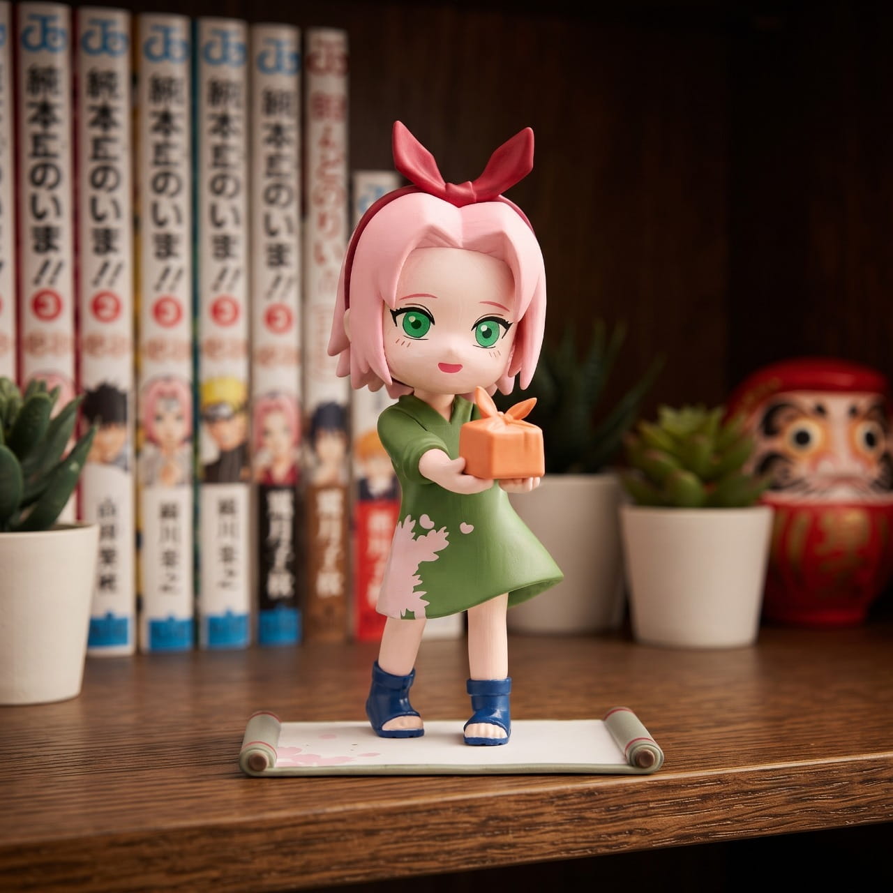 Figurine chibi Sakura Haruno — robe verte, boîte-repas tendue à bout de bras — Naruto, étagère (décor non inclus)