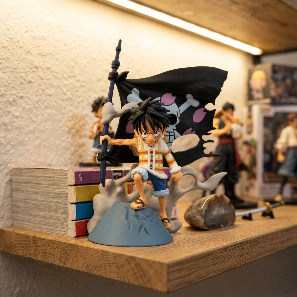 Diorama One Piece Luffy plantant son pavillon, exposé sur une étagère (décor non inclus)