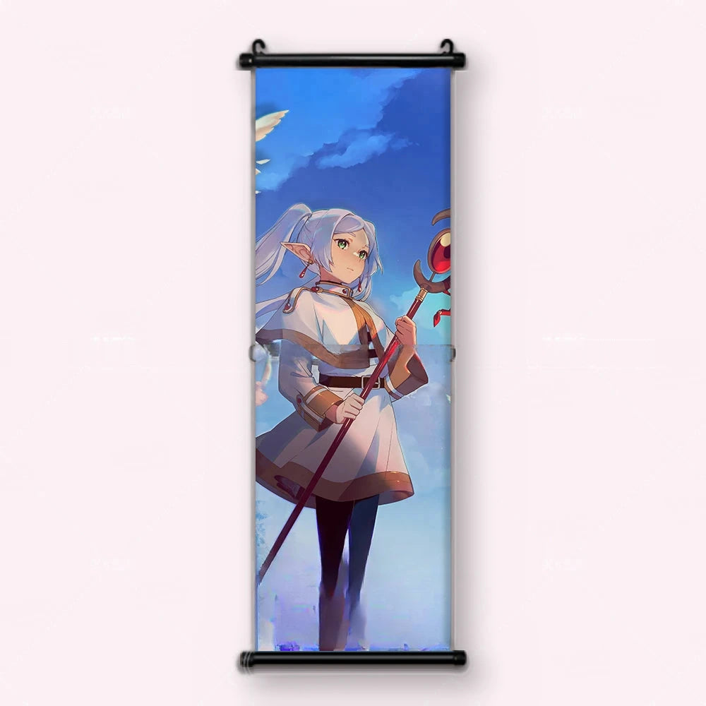 Kakémono Frieren, Frieren debout, bâton planté, sous un grand ciel bleu, vu de face : toile tendue entre ses deux baguettes de bois, cordon de suspension fourni