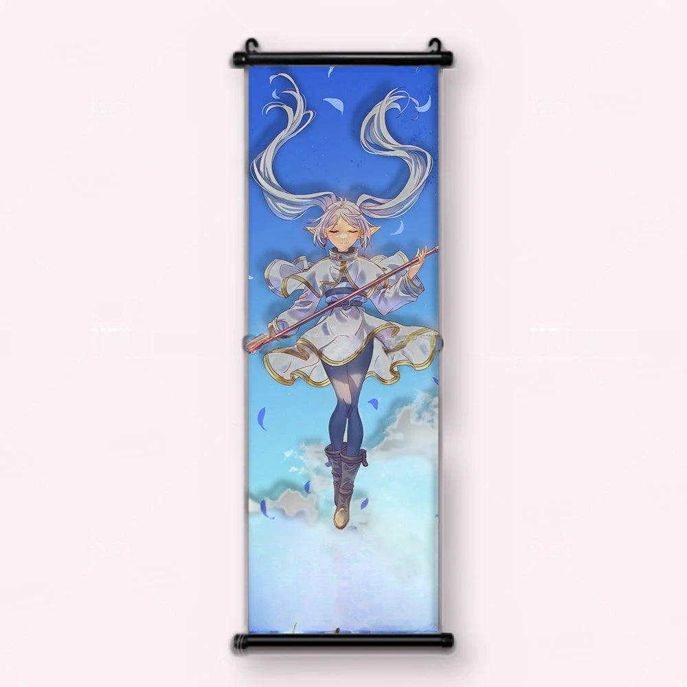 Kakémono Frieren, Frieren en lévitation, yeux clos, bâton horizontal, dans un ciel bleu, vu de face : toile tendue entre ses deux baguettes de bois, cordon de suspension fourni
