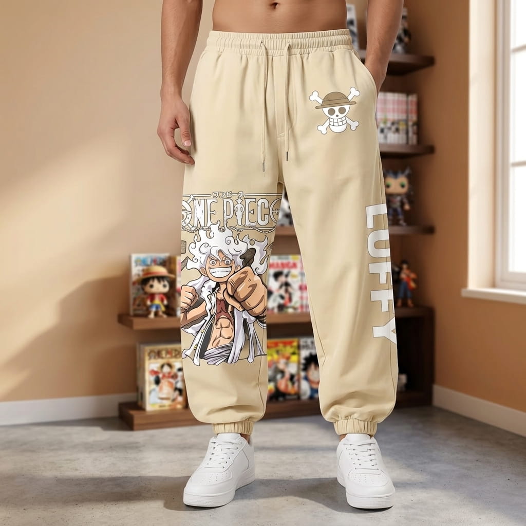 Beige One Piece joggers worn, Luffy Gear 5 printed on the thigh and LUFFY down the leg (decor not included)