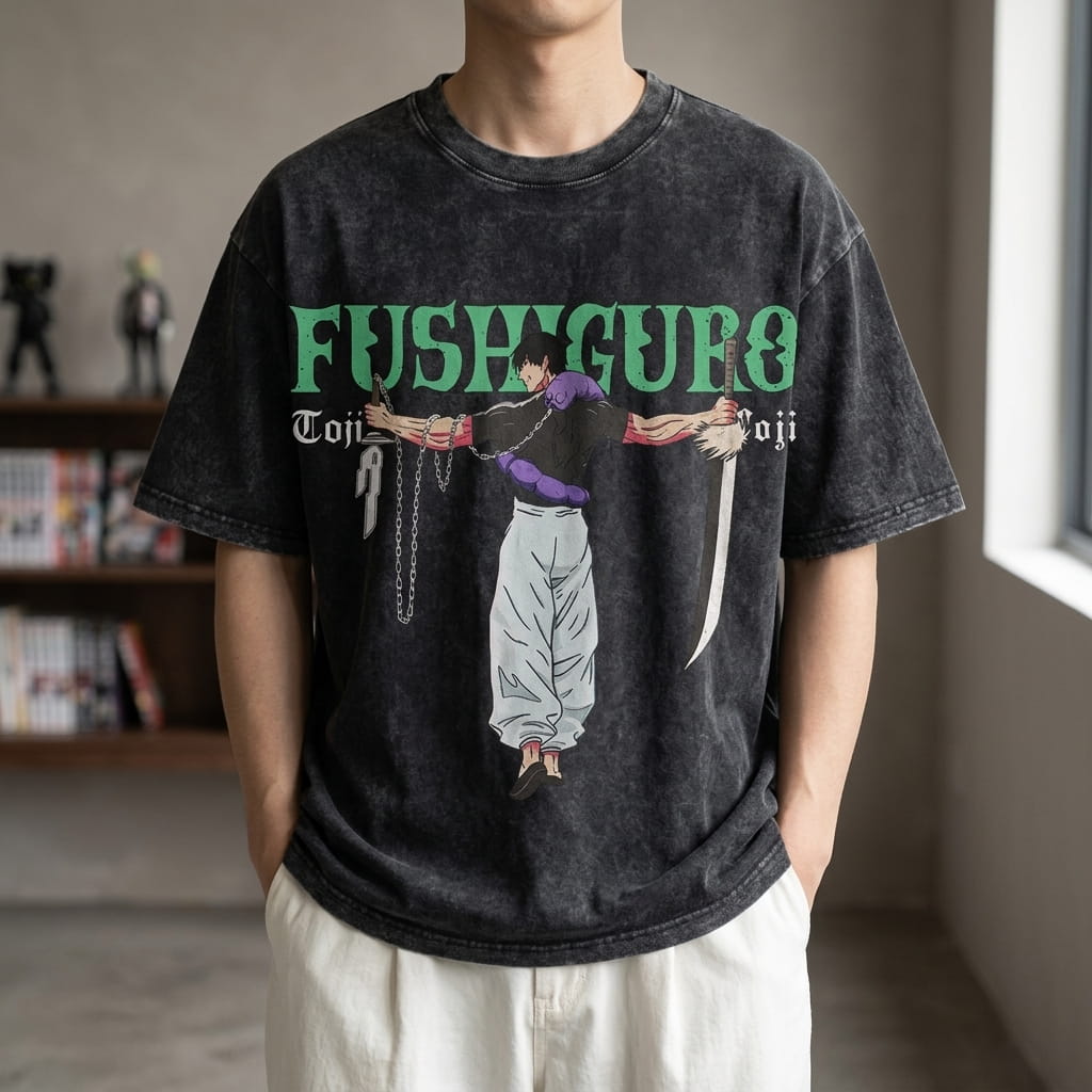 Washed black Jujutsu Kaisen T-shirt worn, Toji Fushiguro full length, taut chain and curved blade, his name FUSHIGURO in green above, printed on the front (decor not included)